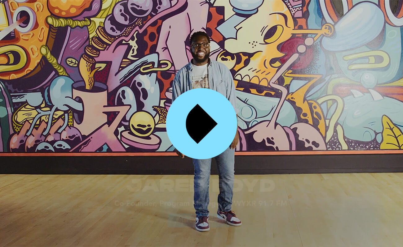 Video Thumbnail Man and Mural Play Button