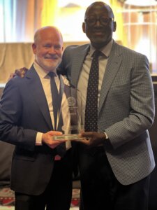 President & CEO Ted Townsend and Chief Government Affairs Officer Bobby White pose with the Chamber of the Year award upon winning